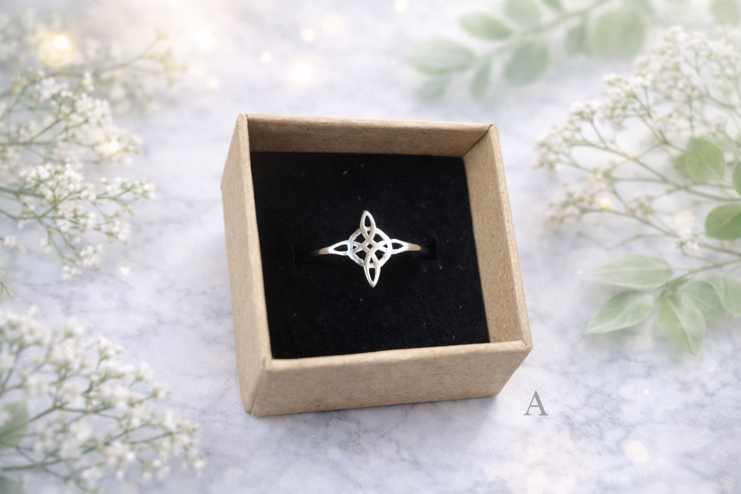 Anillo nudo de bruja acero