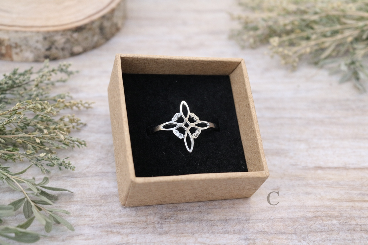 Anillo nudo de bruja acero