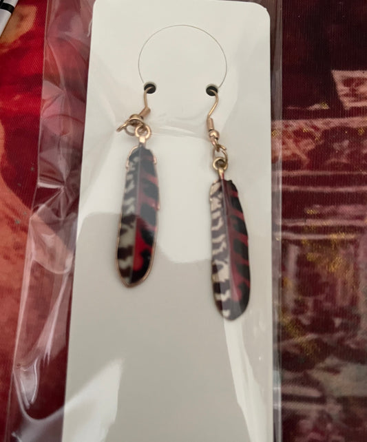 Pendientes plumas